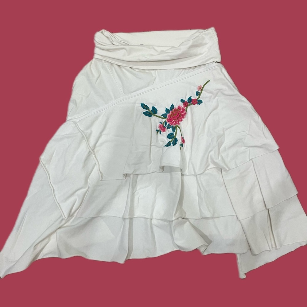 White flowy skirt with embroidered floral motif